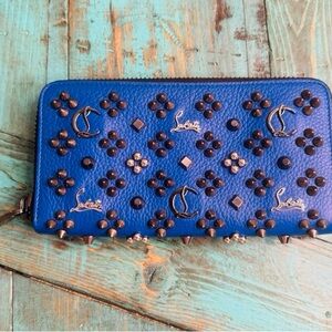 Christian Louboutin studded Panettonewallet in excellent condition and authentic